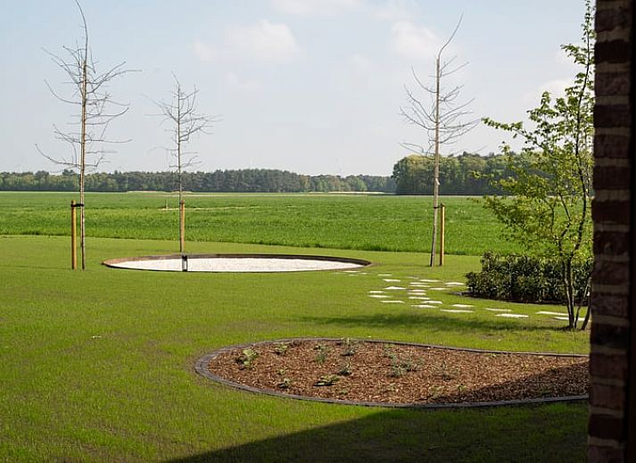 Modern vacation home in Kasterlee, Antwerp, surrounded by greenery and natural surroundings, ideal for a relaxing stay.