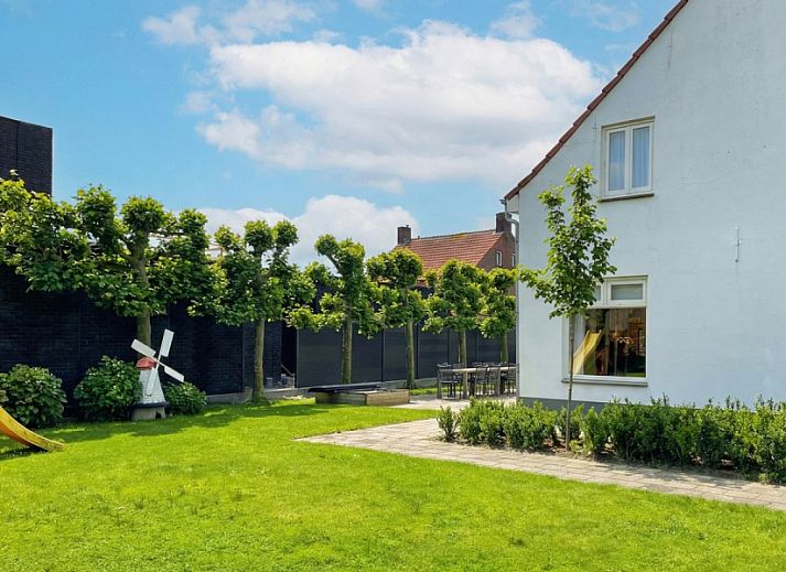 De Morgenstond vakantiehuis in Baarle-Hertog, Antwerpen met groene tuin en terras voor ontspanning in een landelijke omgeving.