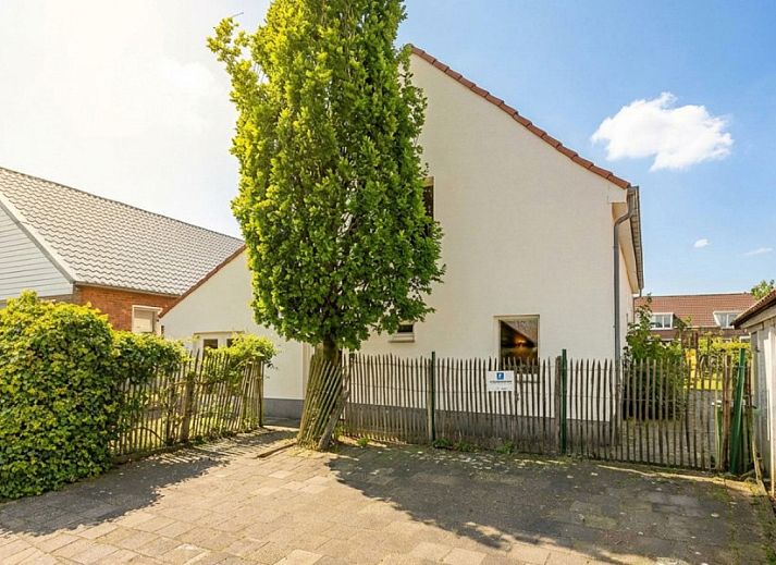 De Morgenstond vakantiehuis in Baarle-Hertog, Antwerpen met groene tuin en terras voor ontspanning in een landelijke omgeving.