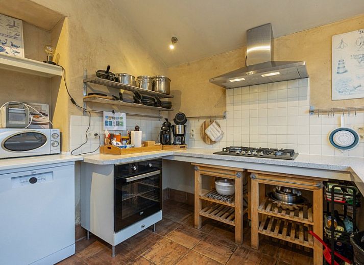 Speeltuin en groene tuin bij De Morgenstond vakantiehuis in Baarle-Hertog, Antwerpen, perfect voor gezinnen en natuurliefhebbers.