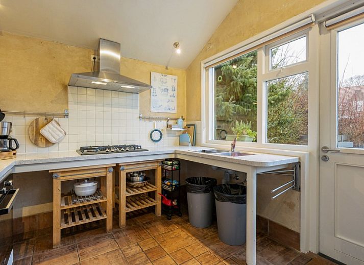 Speeltuin en groene tuin bij De Morgenstond vakantiehuis in Baarle-Hertog, Antwerpen, perfect voor gezinnen en natuurliefhebbers.