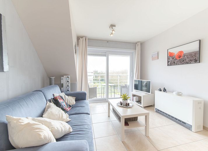 Attractive bedroom in Apartment Bowie with shared pool in De Haan, Antwerp, Belgium, with modern decor and comfortable beds.