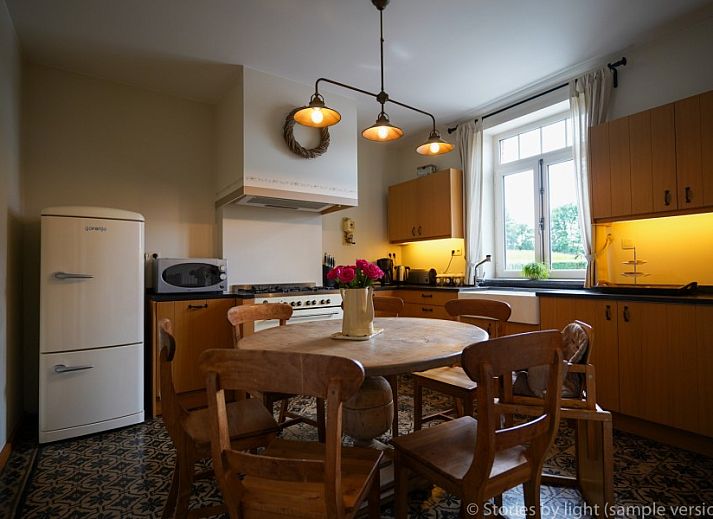 Cozy bedroom in vacation home Tivoli, Dilsen-Stokkem, Limburg, Belgium with classic interior and wooden floor.