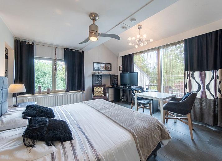 Stijlvolle woonkamer in Vakantievilla De Witte Merel, Paal, Beringen, Limburg.