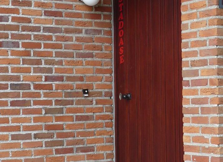 StadOase-Hasselt vakantiehuis in Hasselt, Belgie met charmante bakstenen gevel.