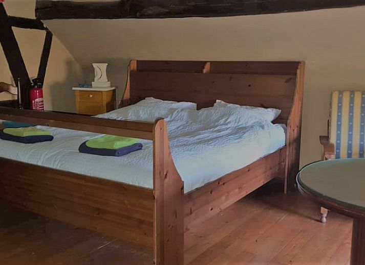 Geniet van het uitzicht vanaf het terras van Huisje in Sint Pietersvoeren, een vakantiehuis in het schilderachtige Limburgse landschap in Belgie.