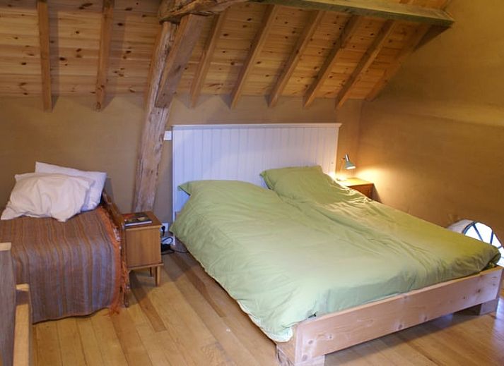 Restful view of the pond from the garden of Holiday Home in Sint-Truiden, Limburg, Belgium.