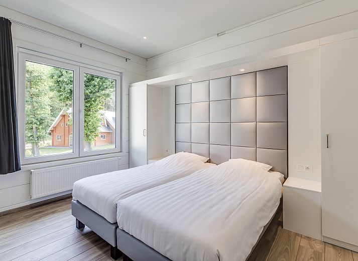 Plattegrond van Mooi Zutendaal 10-persoons villa in Limburg, Belgie, met vier slaapkamers en moderne voorzieningen.