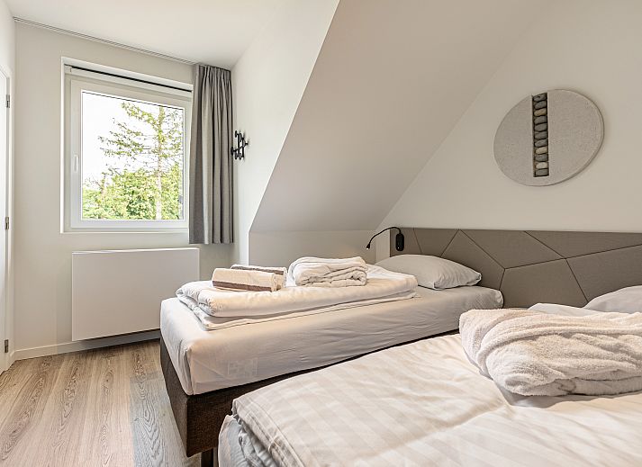 Plattegrond van Mooi Zutendaal 6-persoons villa in Limburg, Belgie, met ruime slaapkamers en moderne badkamers voor een comfortabel verblijf.