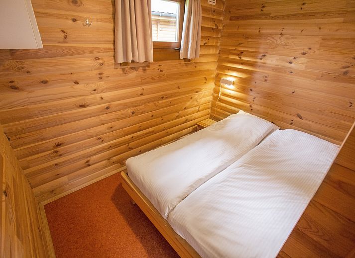 Plattegrond van Mooi Zutendaal 4-persoons chalet in Limburg, Belgie met ruime woonkamer en moderne keuken.