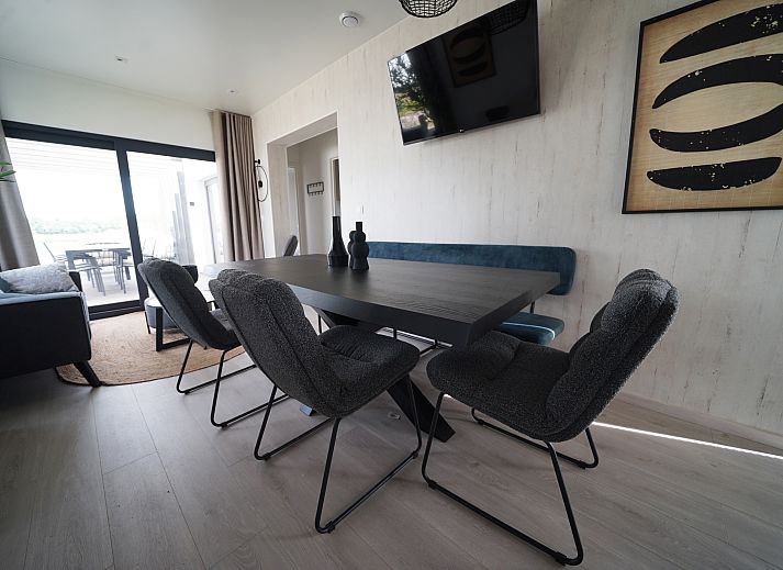 Chalet in Zutendaal, a modern vacation home in green Limburg, Belgium, with an inviting terrace and beautiful natural surroundings.