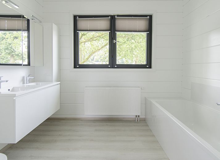 Plattegrond van Mooi Zutendaal 10-persoons villa in Limburg, Belgie, met ruime woonkamer, eetgedeelte en terras voor een ontspannen vakantie.