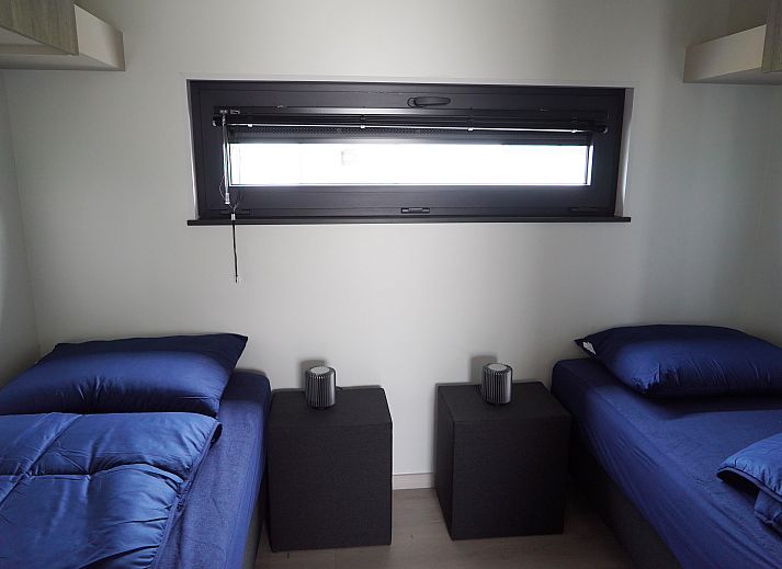 Chalet in Zutendaal offers beautiful lake views and green surroundings, ideal vacation home in Limburg, Belgium.