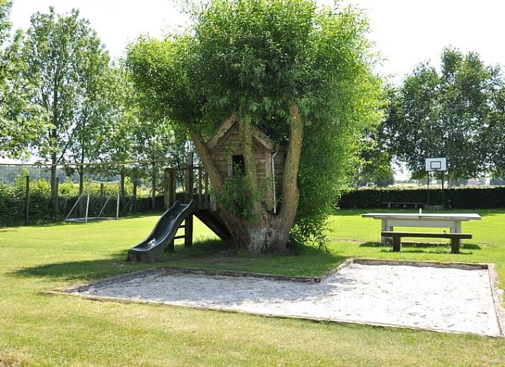 Exterior of Holiday home in Hombourg, Ardennes, with rainbow and green surroundings, idyllic location for a vacation in Belgium.