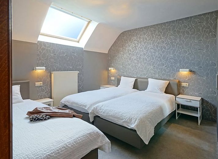 Exterior of Holiday home in Hombourg, Ardennes, with rainbow and green surroundings, idyllic location for a vacation in Belgium.