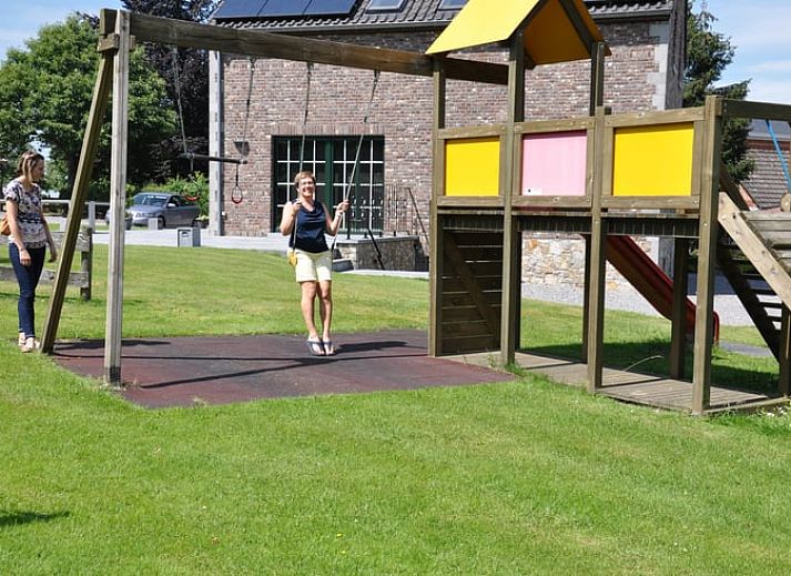 Exterior of Holiday home in Hombourg, Ardennes, with rainbow and green surroundings, idyllic location for a vacation in Belgium.