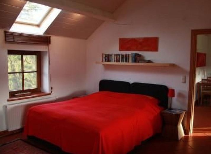 Charming Apartment Vue au Jardin with stone facade and terrace in Hombourg, Ardennes, Belgium, ideal for nature lovers.