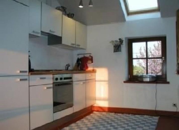 Charming Apartment Vue au Jardin with stone facade and terrace in Hombourg, Ardennes, Belgium, ideal for nature lovers.