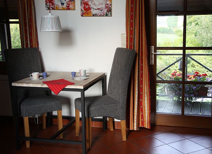 Cozy indoor area of Apartment Vue au Jardin in Hombourg, Ardennes, with stylish decor and garden views.