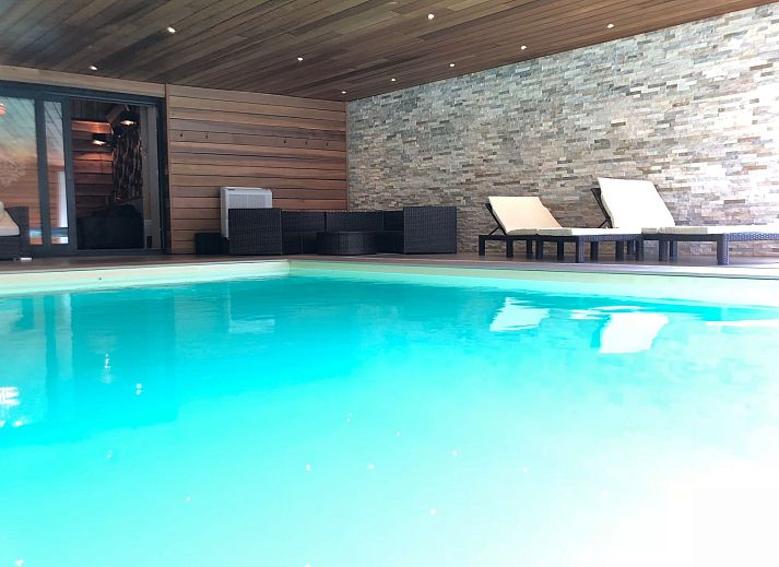 Relax by the indoor pool of Holiday Home Villa 'Marie France' Wellness in Stavelot, Ardennes, ideal for 9 people.