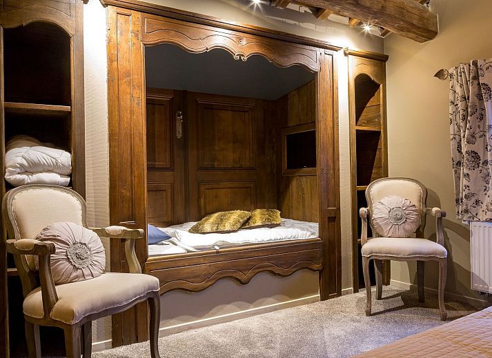 Relax by the indoor pool of Holiday Home Villa 'Marie France' Wellness in Stavelot, Ardennes, ideal for 9 people.