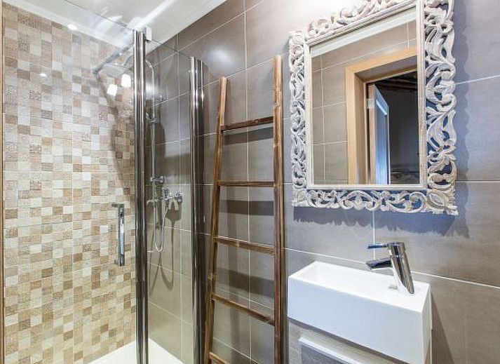 Cozy bedroom in Holiday Home Villa 'Marie France' Wellness, Stavelot, Ardennes, with authentic wooden interior and rustic ceiling.