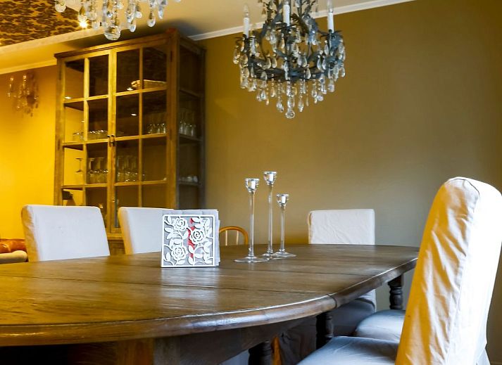 Cozy bedroom in Holiday Home Villa 'Marie France' Wellness, Stavelot, Ardennes, with authentic wooden interior and rustic ceiling.
