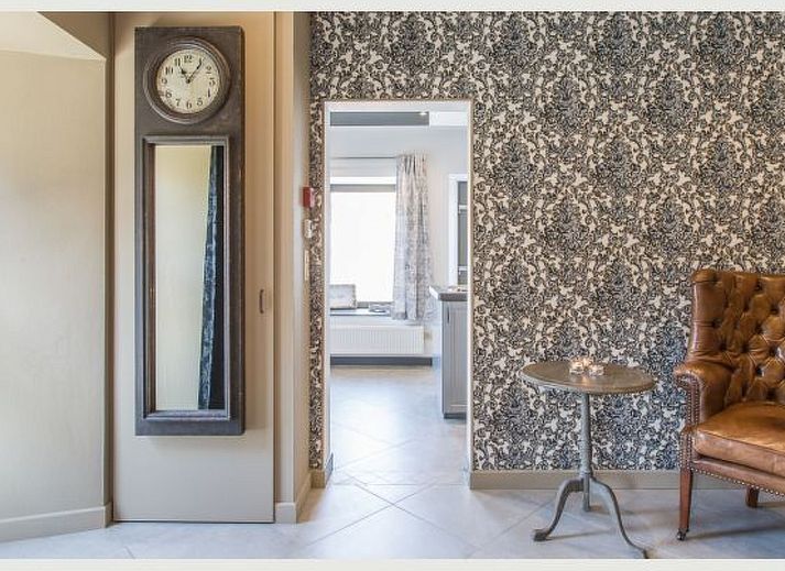 Cozy bedroom in Holiday Home Villa 'Marie France' Wellness, Stavelot, Ardennes, Belgium, with rustic interior and warm lighting.