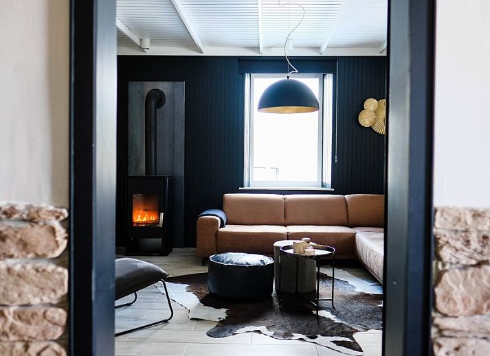 Uitzicht op vakantiehuis Agence-en-Douane in Butgenbach, omgeven door bossen in de Ardennen, Belgie.