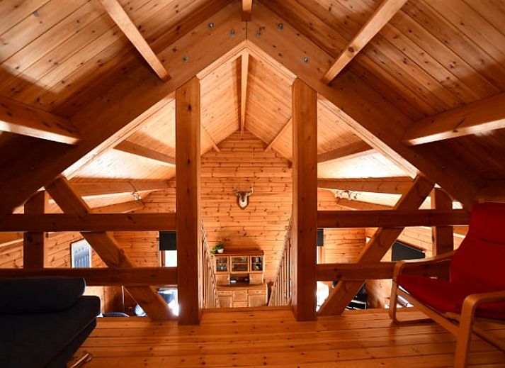 Buitenterras van Vakantiehuis in Stavelot, Ardennen, met ruime zitgelegenheid en uitzicht op de groene omgeving.