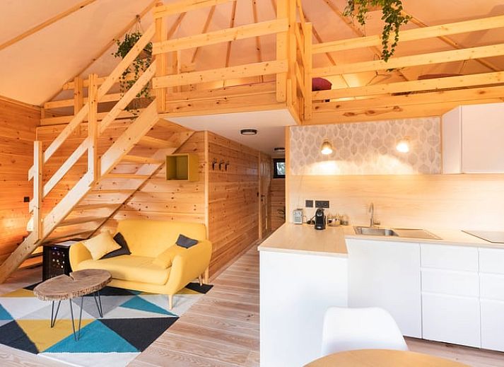 Entspannen Sie sich auf der Terrasse von Holiday home in Hannut, einem charmanten Ferienhaus in den ruhigen Ardennen, Luettich, Belgien.