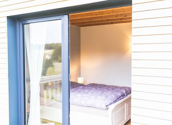 Dekorative Eule bei Ferienhaus in Kuechelscheid, gelegen in der gruenen Umgebung der Ardennen, Luettich, Belgien.