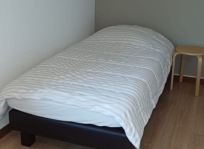 Groene tuin van Vakantiewoning 1 in Ouren, Ardennen, perfect voor ontspanning met uitzicht op de heuvels.