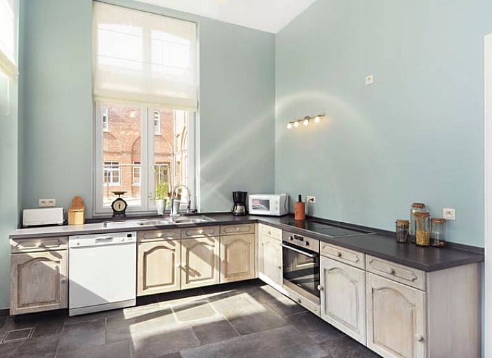 Vakantiehuis in Wodecq, prachtig exterieur met historische bakstenen gevel in Henegouwen, Belgie.