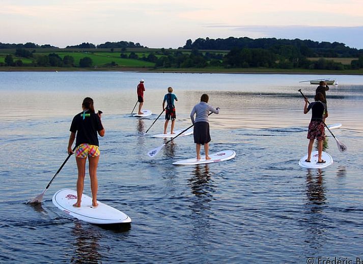 Cozy hallway with wooden beams in Holiday home in Sivry, Hainaut, Belgium, offers a warm and authentic atmosphere.