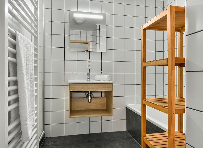 Cozy living room of Village l'Eau d'Heure 4-person dog bungalow in Froidchapelle, Hainaut overlooking nature.