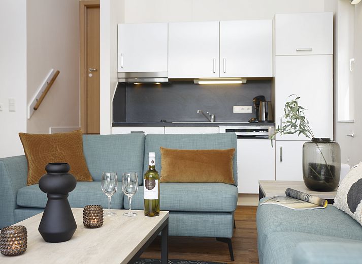 Cozy living room in Village l'Eau d'Heure, 4-person dog bungalow in Froidchapelle, Hainaut, Belgium with modern furnishings.