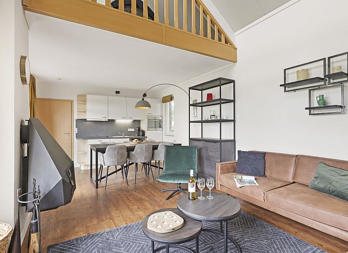 Cozy living room in Village l'Eau d'Heure 6-bed bungalow, Froidchapelle, Hainaut, with modern decor and large window.