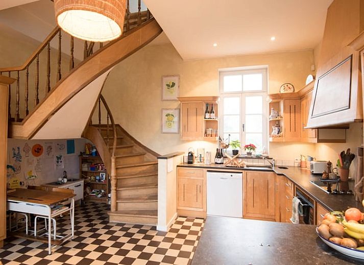 Cozy living room with fireplace in Holiday home in Sars-la-Bruyere, Hainaut, Belgium.