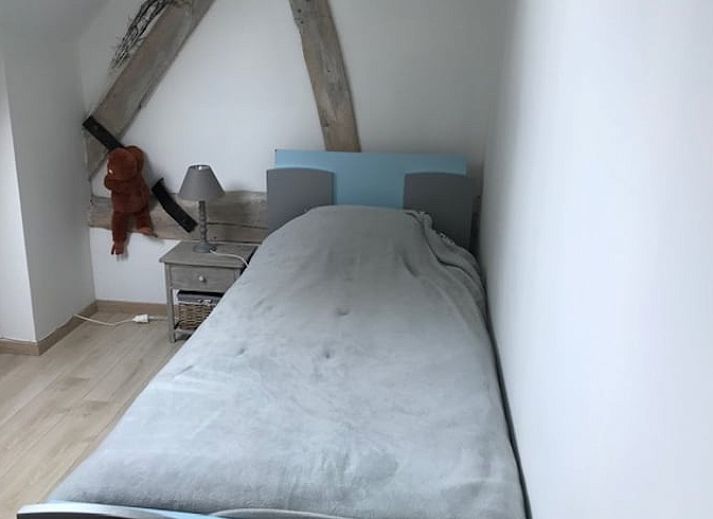 Geraeumiger Tagungsraum mit Backsteinwand in einem Landhaus in Leuze en Hainaut, ideal fuer Tagungen in Belgien.
