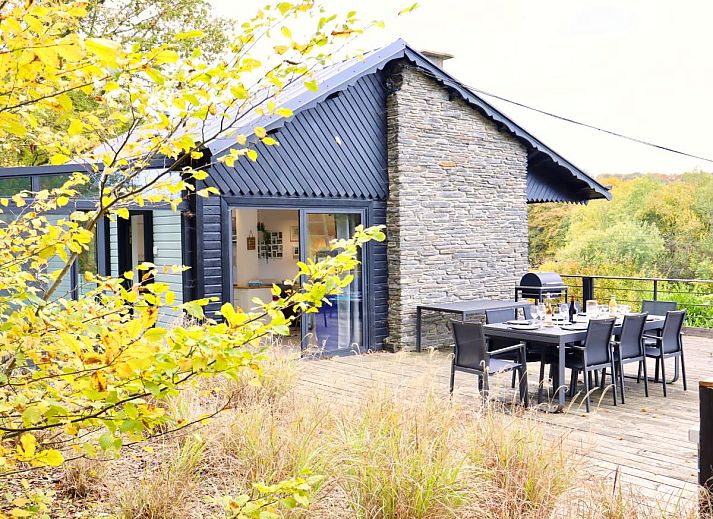 Enjoy the panoramic view from the terrace of chalet Agathe in Laforet, Ardennes, perfect for a relaxing vacation in nature.