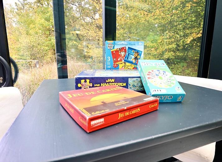 Enjoy relaxation and games at Chalet Agathe, Laforet, Ardennes. Bright indoor space with ping pong table and views of nature.