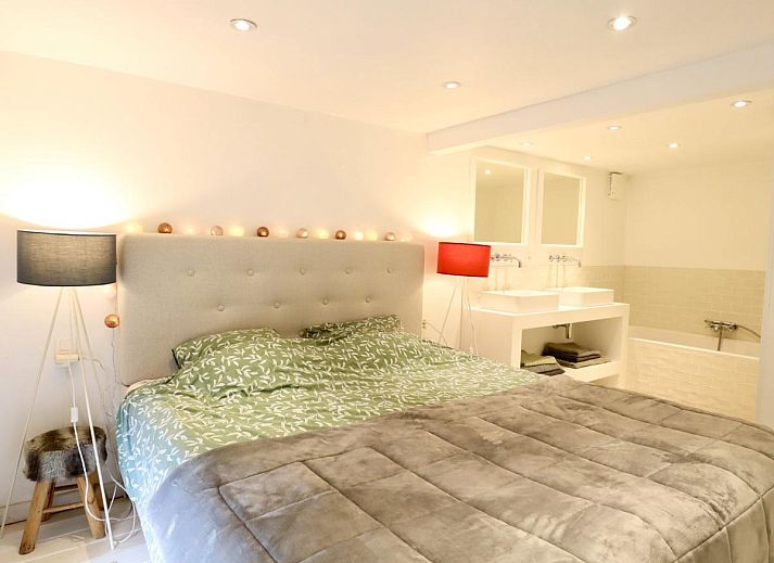 Chalet Agathe in Laforet, Ardennes, Belgium with spacious terrace and surrounded by lush nature.