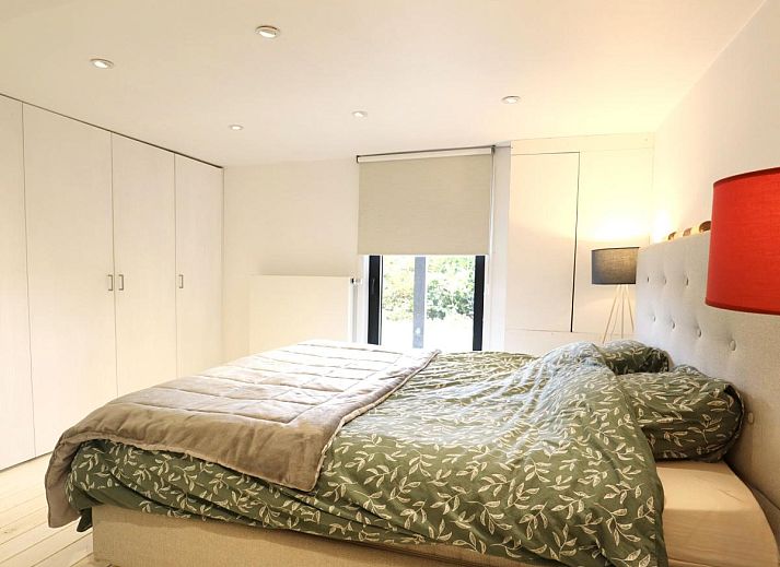 Chalet Agathe in Laforet, Ardennes, Belgium with spacious terrace and surrounded by lush nature.