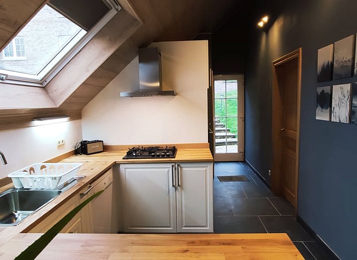 Vacation home in Fosses-la-Ville with green garden and sitting area, perfect for relaxation in the Ardennes, Belgium.