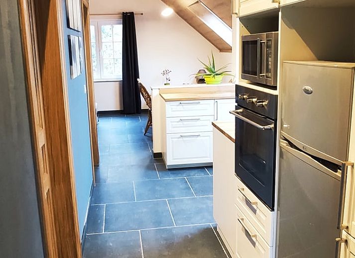 Vacation home in Fosses-la-Ville with green garden and sitting area, perfect for relaxation in the Ardennes, Belgium.