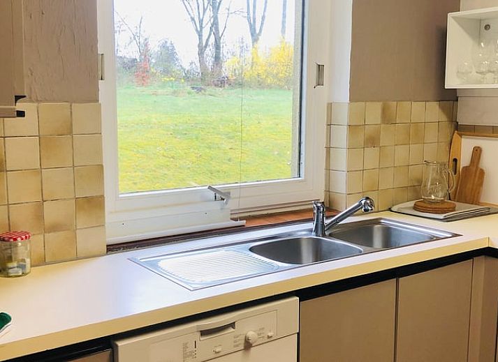 Knusse open haard in Vakantiehuisje in Gros Fays, een warme retraite in de Ardennen, Namen, Belgie.