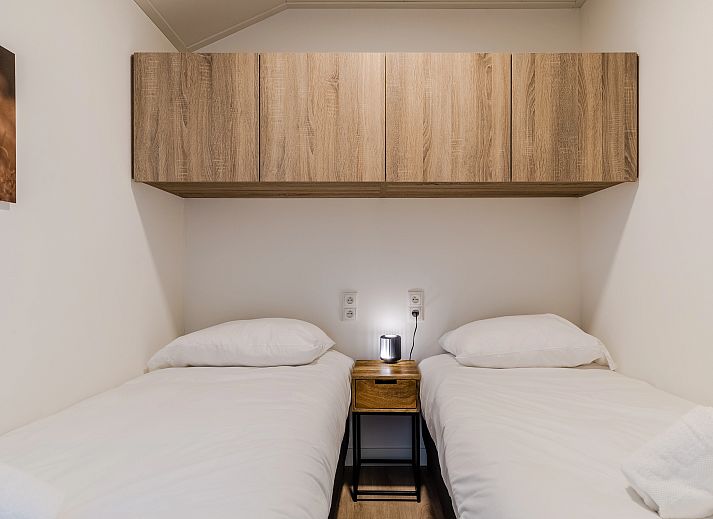 Gemuetliches Wohnzimmer in der 4-Personen-Ferienwohnung 4B2 in Gesves, Ardennen. Gemuetliches Ferienhaus mit Blick auf Terrasse und Natur in Belgien.