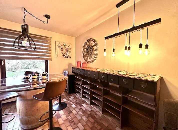 Leora Cosy vacation home in Membre, Ardennes, Belgium with sunny terrace and green surroundings for a relaxing stay.