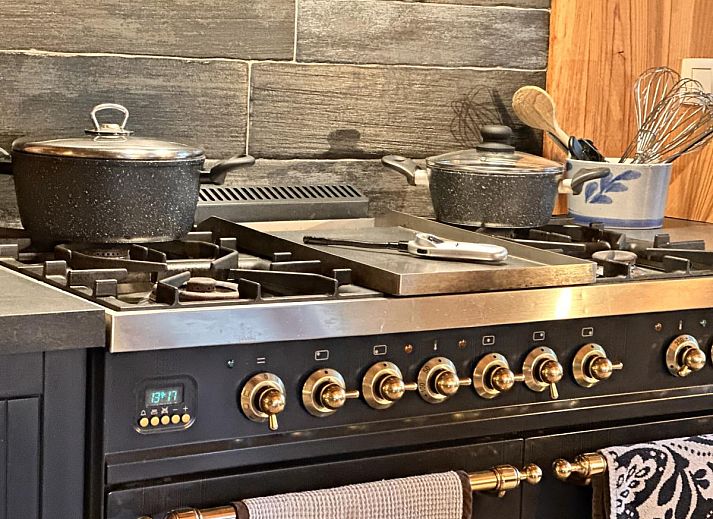 Leora Cosy vacation home in Membre, Ardennes, Belgium with sunny terrace and green surroundings for a relaxing stay.